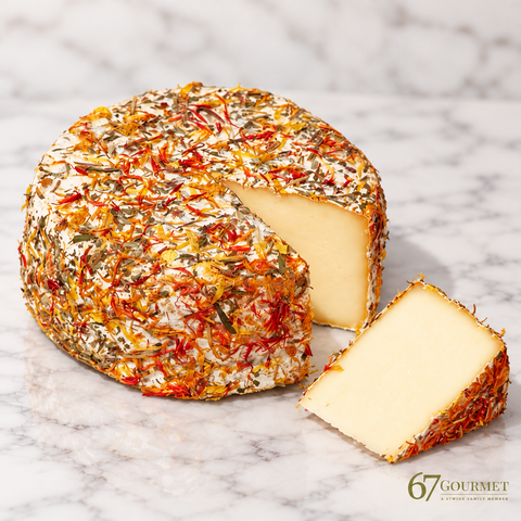 Capriole - Julianna, farmstead aged goat cheese encrusted in herbs (Indiana, priced per ounce)